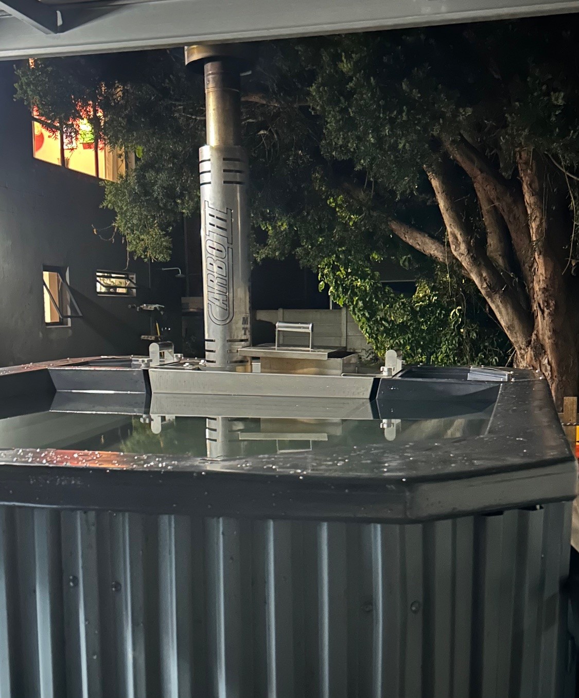 Mobile hot tub with scenic evening view